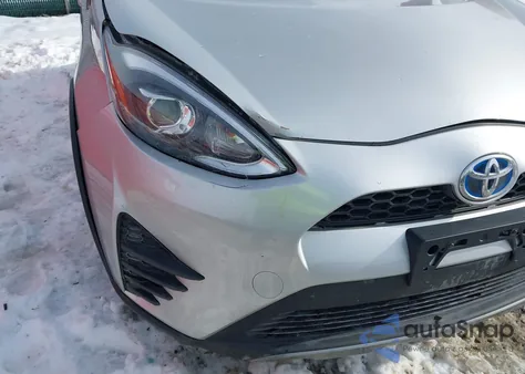 2018 Toyota Prius C Two from USA, damaged, VIN JTDKDTB30J1601457